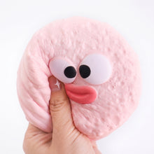Hand squeezing Pouty Puff Pink Meltdown slow rising squishy